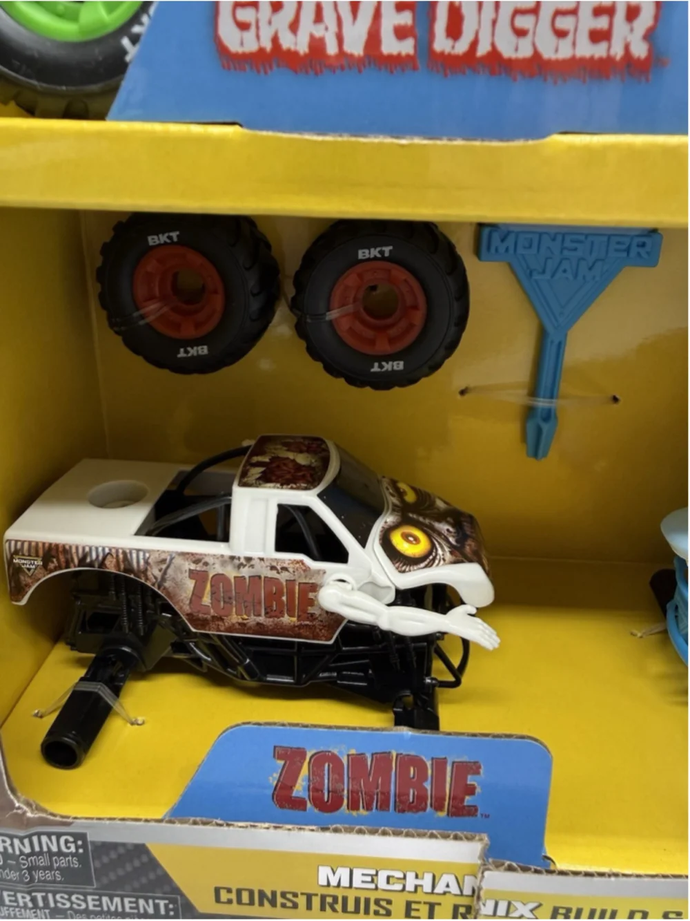 Monster Jam Mechanix 4 Pack Rebuild 1/43 El Toro Grave Digger Zombie Meglodon